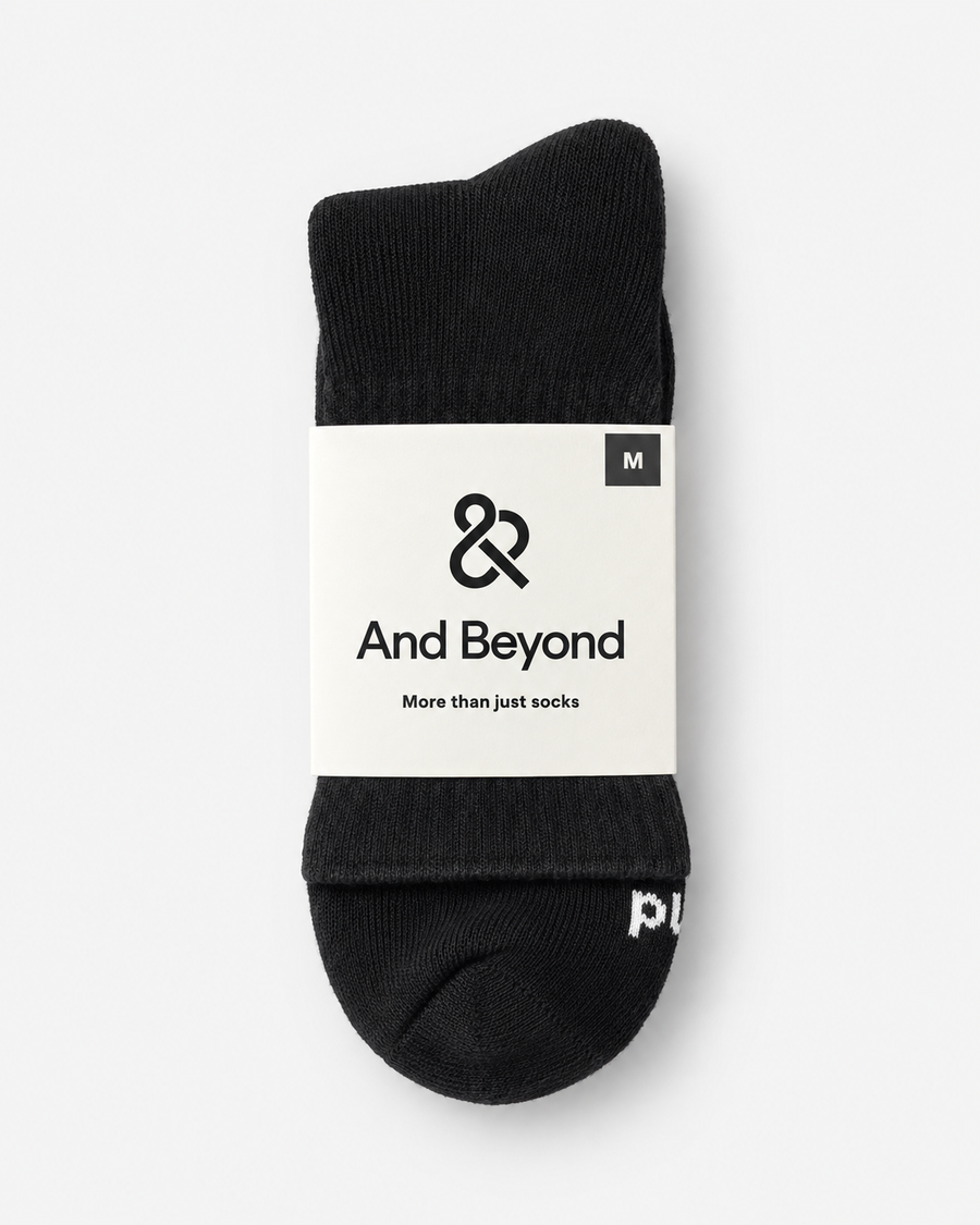 Black And Beyond Classic Mid Crew socks in branded packaging